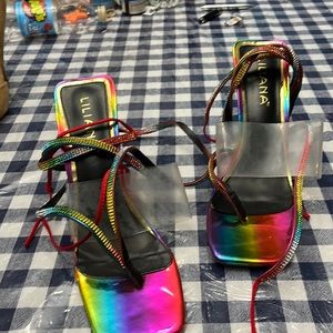 Gently used Liliana rainbow rhinestone wrap around to knee heels